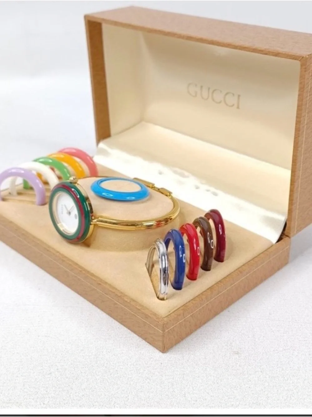 Gucci Gold Bangle Watch with Green and Red Bezel